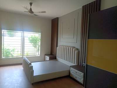 customized bed with wallpanelling