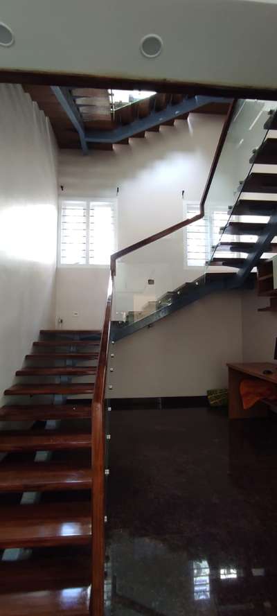 #staircase handrails with glass and wood