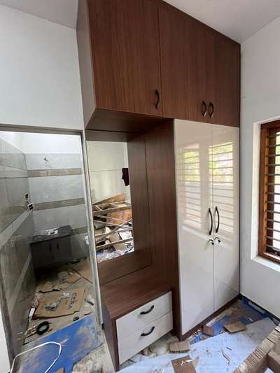 Designed by me
Wardrobe in kollam site
Material: marineply710 bwp
 #InteriorDesigner