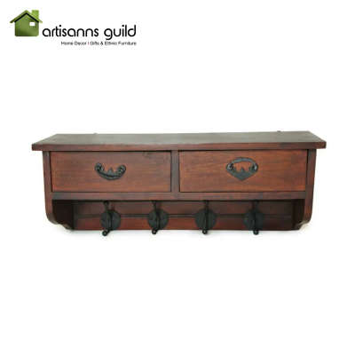 Wooden stand with two drawers and 4 hooks:-

Declutter your home with this stylish and abstract wooden wall stand with hooks. Utilize the drawers for extra organizing space and hooks for your keys and other utilities. Use this stand for displaying your curios and any other decorations . A utility item ideal for gifting purpose
