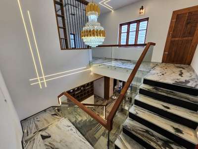 Stair area work...
.
.
.
 #InteriorDesigner #KitchenInterior  #Architectural&Interior  #LUXURY_INTERIOR  #HouseConstruction   #ConstructionCompaniesInKerala