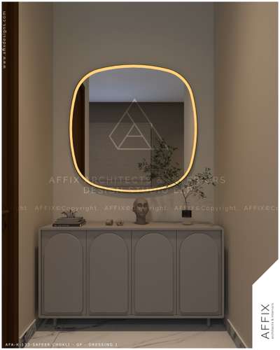 A minimal and elegant dressing corner featuring a softly illuminated organic-shaped mirror, a sleek arched cabinet, and subtle décor that adds warmth and sophistication to the space. #Architect  #architecturedesigns  #Architectural&Interior  #architecturekerala  #kerala_architecture  #best_architect  #dressinginterior  #dressings_table