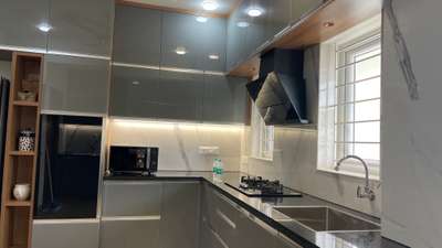 Laquered glass kitchen  #laquered  #ModularKitchen  #glasskitchen 
 #greykitchen