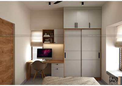 The ultimate multi-functional bedroom! ✨ Seamlessly blending a cozy sleep area, a sleek workspace, and ample storage in one frame. 🏠❤️

#BedroomDesign

#HomeOfficeSetup

#WardrobeDesign

#SpaceSavingIdeas

#InteriorDesignIndia

#WorkFromHomeSpace

#ModernBedroom

#BedroomInteriors

#KoloApp

#KoloIndia

#KeralaInterior

#SmartHomeDesign

#InteriorInspiration