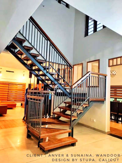 #stupacalicut #Architect #Architectural&Interior #WoodenStaircase #metalstairs #lowbudgethousekerala #KeralaStyleHouse #moderndesign #FlooringTiles #godsowncountry