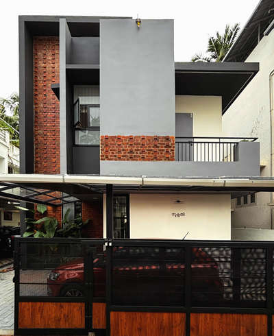 A compact urban residence defined by exposed brick, clean grey volumes, and bold geometric lines. A warm, contemporary home crafted for seamless city living.
Client: Staish Madhavan | 1530 sqft | 4 Bedroom Residence
#Architecture #ResidenceDesign #ContemporaryHome #BrickFacade #ModernArchitecture #UrbanLiving #ArchitecturalDesign #MinimalDesign #koloprojects