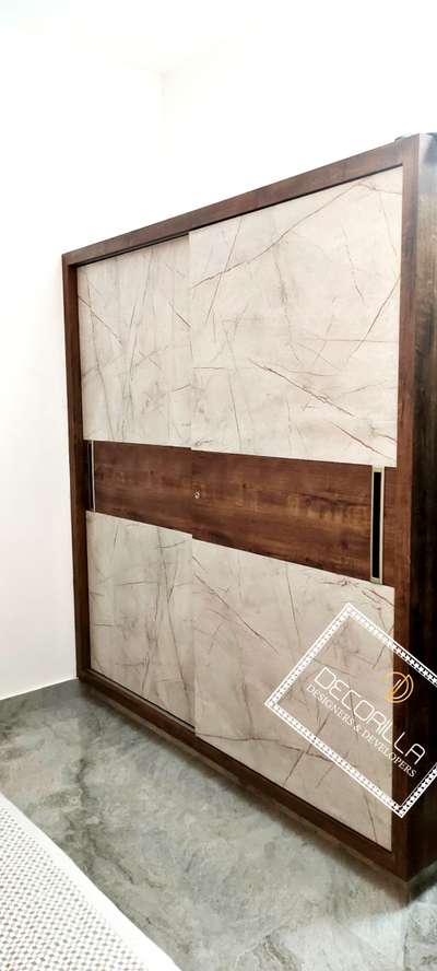 #WardrobeDesigns #slidingwardrobe #SlidingDoorWardrobe #mica #plywoodinterior #bestdesign