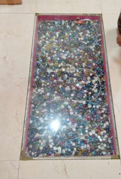 clear glass on the floor with crystals