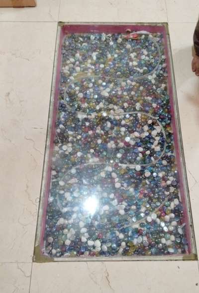 clear glass on the floor with crystals