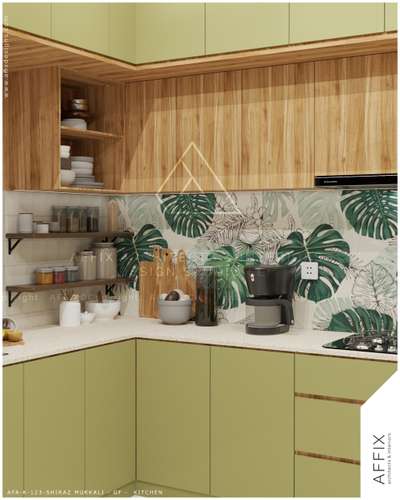 The kitchen combines matte olive green base cabinets and overhead panels with natural wood veneer cabinets above, featuring a striking botanical leaf-patterned backsplash and floating wood shelves over a light speckled countertop. #Architect  #architecturedesigns  #Architectural&Interior  #atchitecture  #KitchenIdeas  #KitchenCabinet  #ModularKitchen