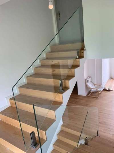 Glass Rails for your Homes using safety glass with bottom spigot