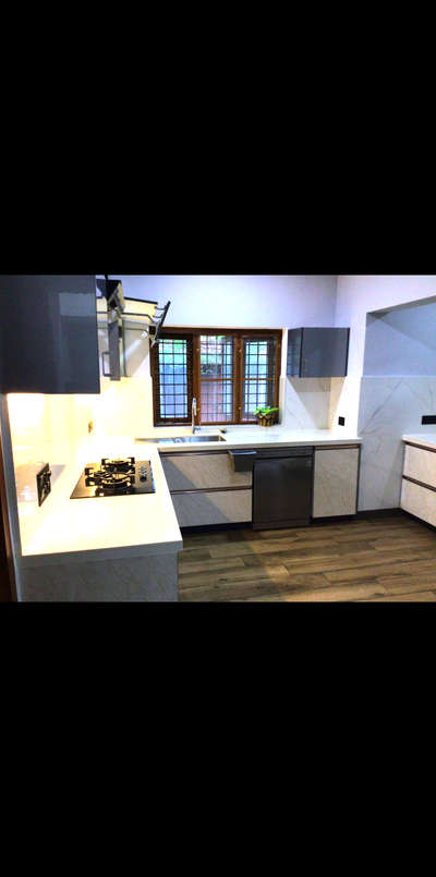 It is a renovation of a simple kitchen to Modular Kitchen.
For more best interior designs follow my page. 
#KitchenIdeas #kichen_chimney #KitchenIdeas #ModularKitchen    #modularwardrobe#kichenspace #KitchenRenovation #KitchenCeilingDesign  #KitchenCabinet #WallDesigns #KitchenInterior  #KitchenLighting #Ernakulam #Idukki #kochi