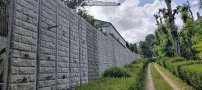 Retaining wall cum compound wall