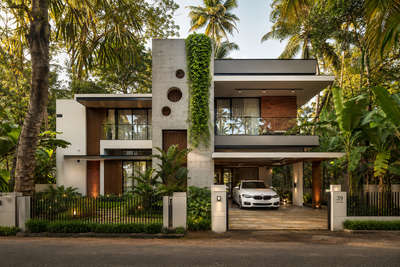 #Ernakulam  #3BHK  #2500sqft #doublestorey  #tropicalcontemporary  #ContemporaryDesigns  #conceptualdesign  #BalconyIdeas  #LandscapeIdeas  #75lakhhouse #classicstyle #boxtypeelevation  #architecturedesigns  #Architectural&Interior  #InteriorDesigner #LandscapeDesign  #compoundwall #compoundwalldesign   #gateDesign  #facadedesign