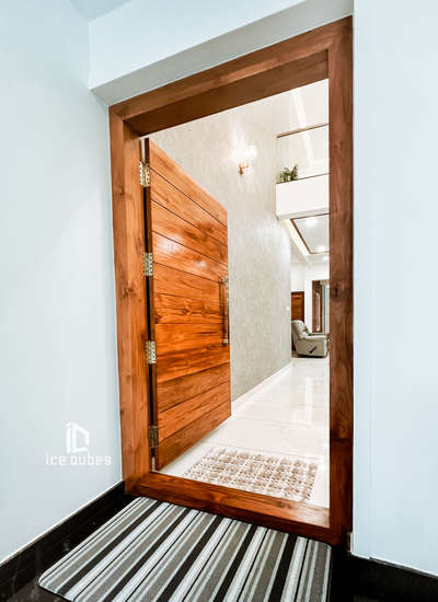 MaIn Door 
#TeakWoodDoors #wood_polishing #KeralaStyleHouse #homesweethome #ContemporaryHouse #architecturedesigns #Minimalistic #kochidiaries #HomeDecor #kodungallur