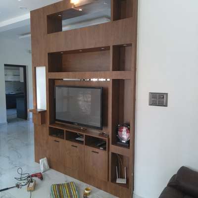Rotated TVUnit. Marine Plywood with Lamination.width 200 cm Hight280cm. Amount Rs: 68000