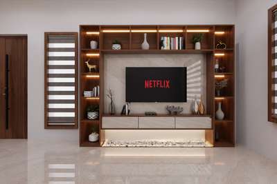 Tv unit with double side book shelf. #InteriorDesigner #KitchenInterior #Architectural&Interior #interiorpainting #LUXURY_INTERIOR #interiorcontractors #interiores #BestBuildersInKerala #buildersthrissur #builders&interior #HouseConstruction #constructionsite #constructioncompany 
.
.