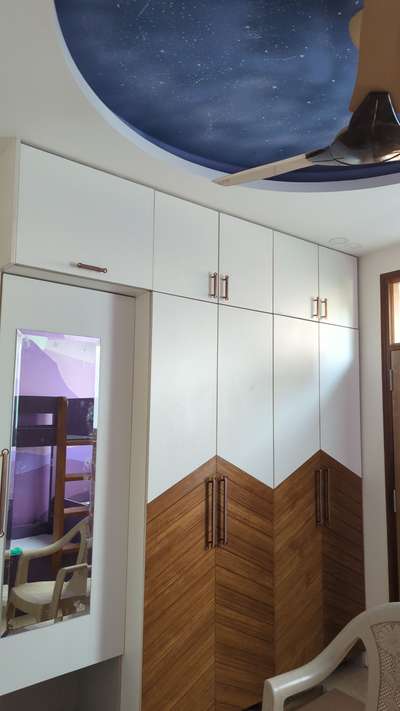 Wardrobe with Dresser Unit. 
Shutters designed with Laminate and Veneer!