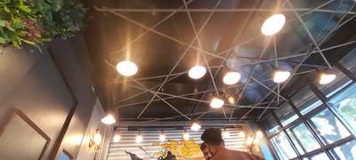 some glimpses of actual site and d 3d prepared from our recently completed cafe interior ... #cafedesign  #restaurant_bar_cafe_designer #cafeseating  #ClosedKitchen  #ceiling  #ropefurniture  #pendantlights  #interriordesign  #delhiinteriors  #cafeinterior