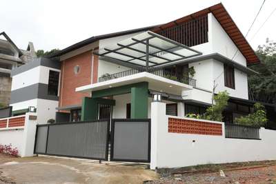 Crafting dreams into reality. Presenting our latest creation—a perfect harmony of contemporary style and tropical elegance. Proudly delivered to its happy owners❣️

#HomeElevationDesign #TropicalArchitecture #ContemporaryDesign #KeralaStyleHomes #DreamHomeDesign #ArchitecturalInspiration #ModernTropicalLiving #KeralaHomes #CustomHomeDesign #LuxuryLivingSpaces #HomeExterior #TurnkeyConstruction #ElevateYourSpace #BeautifulHomes #HomeDesignGoals #TropicalKeralaStyle #ArchitectureLovers #HomeDecorInspo #ModernArchitecture #DreamHomeBuilders
#viya #viyaconstructions #viyabuilders#kochi #Kottayam #Thrissur