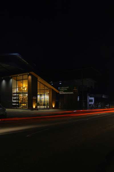 "S.A Roofings' renovated showroom at Mukhampadi, Pattikkad, was a challenging project. The structure comprised steel pipes and roofing sheets, necessitating a makeover within these constraints. The design concept embraced minimalism, retaining the old roofingsheet structure with the same slope. We utilized the showroom's products as facade, incorporated imported lengthy brick cladding, and employed terracotta ceiling tiles. Ambient and highlighting lights illuminated the space, while a showwall showcased S.A Roofings' 40-year history. White walls and concrete finish tiles accentuated the products, and notably, we maintained the same height as the old structure."
. 
. 
. 
. 
. 
. 
. 
#keralahomes #kerala #architecture #keralahomedesign #interiordesign #homedecor #home #homesweethome #interior #keralaarchitecture #interiordesigner #homedesign #keralahomeplanners #homedesignideas #homedecoration #keralainteriordesign  #architect #archdaily  #homestyling #traditional #keralahome #freekeral