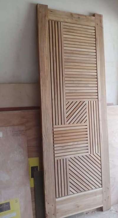 Teak wood Door
 #ModularKitchen  #HouseDesigns  #FoldingDoors