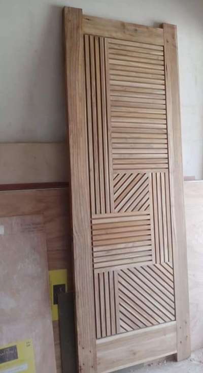 Teak wood Door
 #ModularKitchen  #HouseDesigns  #FoldingDoors