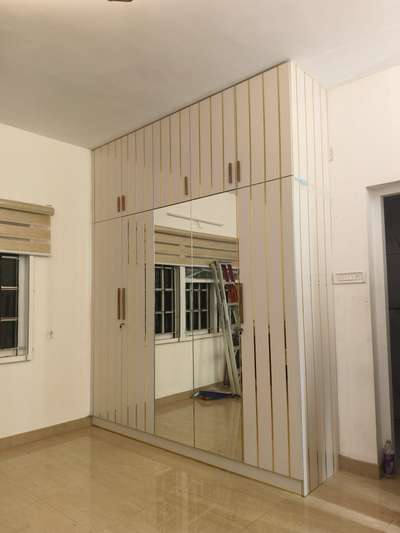 Wardrobe made of WPC and Acrylic laminate.
 #5DoorWardrobe #Acrylic #MasterBedroom