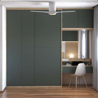 Contemporary Castello Adera Sliding Wardrobe Design With Integrated Study Unit
Wardrobe Design Details:



Type: Sliding wardrobe

Door: 2-door

Wardrobe Dimension (WxDxH): 5x2x9 feet

Style: Contemporary

Colour: Castello adera

Wardrobe shutters: Laminate in suede finish

Design Benefits: A stylish dark green and wood study unit is integrated with the wardrobe design, enhancing the utility of the wardrobe.
Material and finish of the wardrobe can be customised to your liking. 

Carcass Material Options: Medium Density Fiberboard/Plywood/Boiling Water Resistance Plywood/High Density Fiberboard_High Moisture Resistance/Particle board 

Shutter Material Options: Medium Density Fiberboard/High Density Fiberboard_High Moisture Resistance

Shutter Finish Options:Laminate/PU Paint/Anti Scratch Acrylic/Membrane/Pre Laminate/Veneer/Polymer

Size: 9x6 feet
 #SlidingDoorWardrobe  #slidingdoorswardrobe