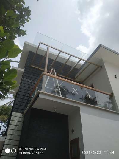 #BalconyIdeas  #Toughened_Glass  #PergolaDesigns  #GlassBalconyRailing   #handrails  #WoodenBalcony