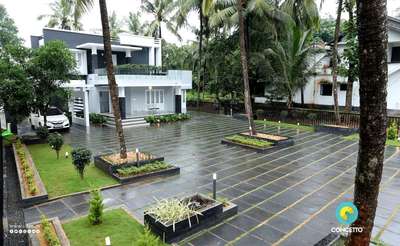 #keralaarchitectures #LandscapeGarden #completed_house_construction #moderndesign #Architectural&nterior #architectsinkerala #best_architect #bestquality #bestdesign #trees #KeralaStyleHouse #keralaarchitectures #bestlandscapedesigners #exteriorpaving #landscapearchitecture