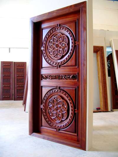 Rosewood finished single shutter solid door with carved panels