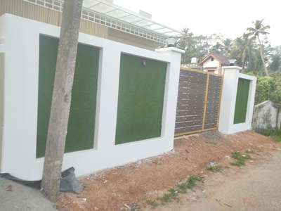 #true interior work cherthla 
#trueinterior work
Artificial grass panneling at wall 
PHONE 8086136906
9061360193