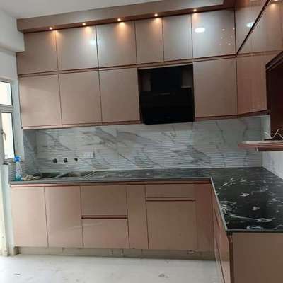 golden finished Moduler kitchen
New design