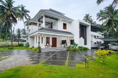 Home that is modern inside out

‘Rithu’ is an apt name for Arun Vadanappilly’s home as it pass on the soothing vibe of seasons. This home has a beautiful interior as well as the exterior. Furniture are made to blend in with the interiors. Cots with headboard, tables and sofas that are contemporary - words fall short to describe the elegance of this home. A home to envy on with it’s simplicity!

Clients : Mr Arun
Location : Vadanappilly

Visualized & Executed by:
AMAC Architects, Interiors & Vasthu Consultants

amacindia@gmail.com
+91 86061 18882
amacarchitects.in

Anand Complex,Opp ICICI Bank, Thrissur, India, Kerala