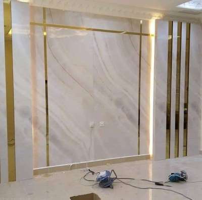 UV MARBLE SHEET WALL WITH GOLDEN PROFILE.  #InteriorDesigner  #interiorpainting