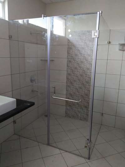 Bathroom Partition various types. Sliding, Door and fixed. Transparent and Etched glass are used. Luxury Simplified..