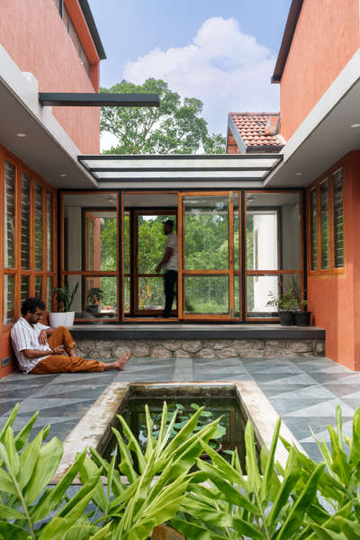 Inside Out Residence - Adoor, Kadampanad

#residencedesignkerala  #keralaplanners #KeralaStyleHouse #keralahomestyle #Residentialprojects #tropicaldesign #earthydesign