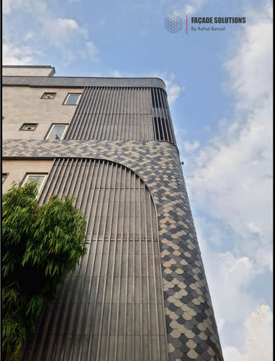 Parametric metal shingles for an exquisite Facade. We provide material + framing + final installation. Custom installtion available.  Google : Facade Solutions by Rahul Bansal.