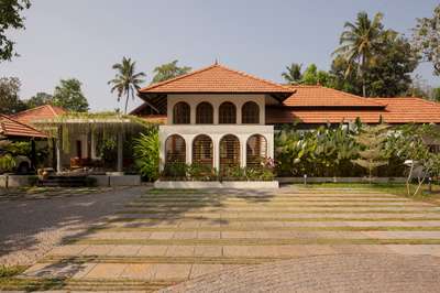 Arcade - Where arches, light, and landscape converse, and tradition finds a quiet contemporary soul.
Completed: 2025 
Area: 4488 Sq.ft
#ContemporaryHouse #colonialarchitecture #colonial_style #arch #keralaarchitectures