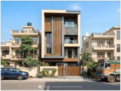 A modern façade crafted with bold geometry, warm wood tones and premium material layering — a perfect blend of elegance and functionality.

At Qala Kriti, we create spaces that don’t just look good…
they feel good, live beautifully, and age gracefully.

Designed by – Qala Kriti