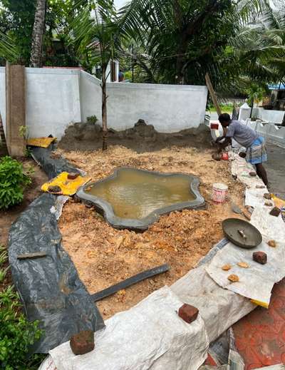 small landscape pond work progres