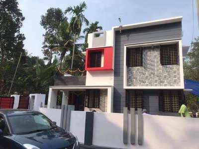 Completed Residential project
Location : Nedumangad
Lsgd : Nedumangad municipality
Total area : 1200sft
plot area : 5cents
Gf - open sitout,living,dining,2 Bed[Attached],Kitchen,Work area
FF - Upper living,1Bed [Attached]
For Design|Consulting|Construction
call/watsapp : 9745745534