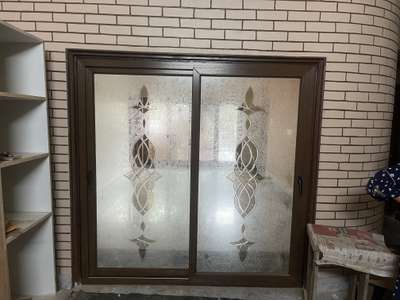 upvc wooden door siliding 1000rs sqrt feet