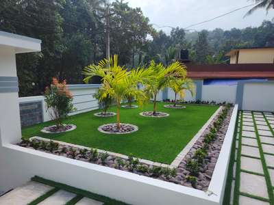 LANDSCAPING WORK @ KOTTYAM 
#artificialgrass #foxtailpalm #pebbleswork #cobblestone #LandscapeIdeas