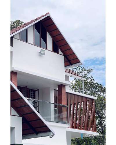 This stunning residence is owned by Vincent sir, situated in Velur , Thrissur Kerala and features a western elevation that is sure to capture your attention.
One of the most striking features of this house is the use of a metal facades as a buffering and for aesthetic purposes. 
This design honours the status of a police officer and the serene atmosphere is perfect for relaxation and unwinding after a long day.
 
#finished #finishedwork #residenceproject #HouseConstruction  #Contractor