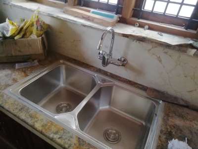 Kitchen sink with mixer tap