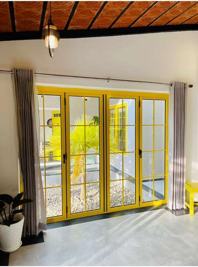 Powder coated aluminum sliding folding , sliding windows, casement windows
HOSTEN ALUMINUM SYSTEM 
#yellow #AluminiumWindows #SlidingDoors #SlidingWindows #slidingfolding #hosten_aluminium_system #kerealahomes #architecturedesigns #Architectural&Interior #mobilephotography #photography #gcon #malppuram #karuvarakund