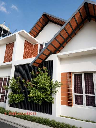 #tropical residence #sloping roof #steel fabrication truss work #clay roof tiles with double layer #vertical steel fabrication  #landscape indoor court