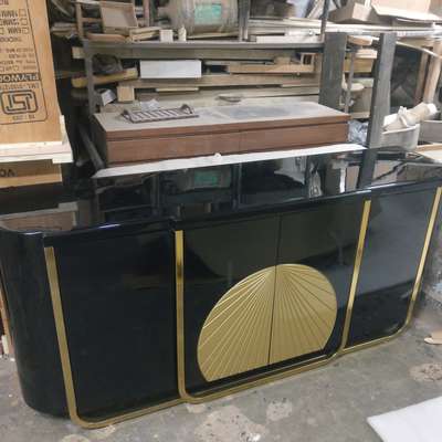 #crockery console #black contemporary console #blavk golden console